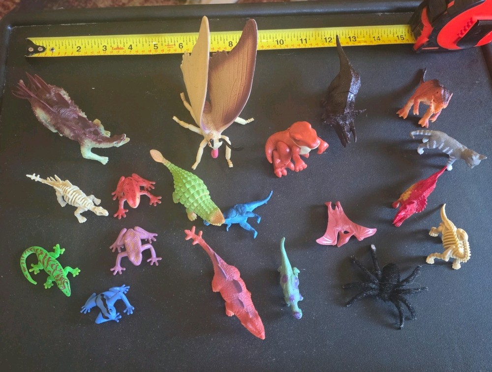 Plastic toy dinosaurs and animals