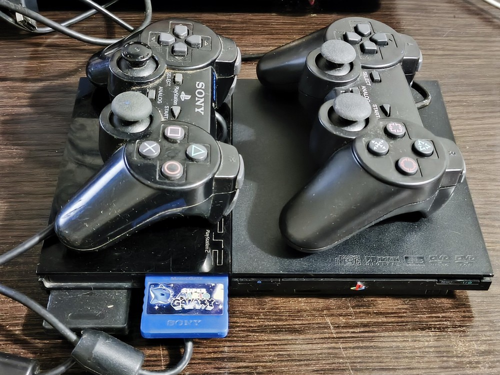 Vintage Sony Playstation 2 console. Game console +2 joysticks