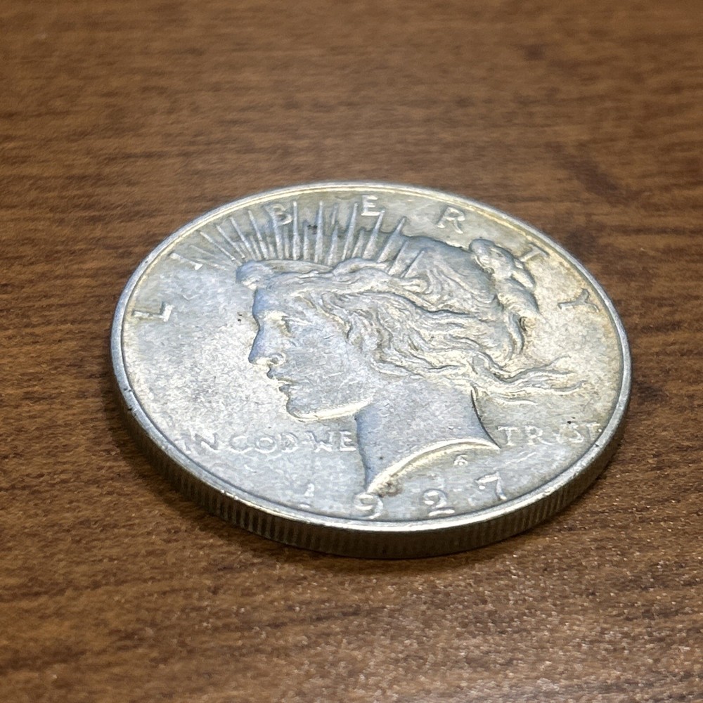 1927-D $1 Peace Silver Dollar AU+