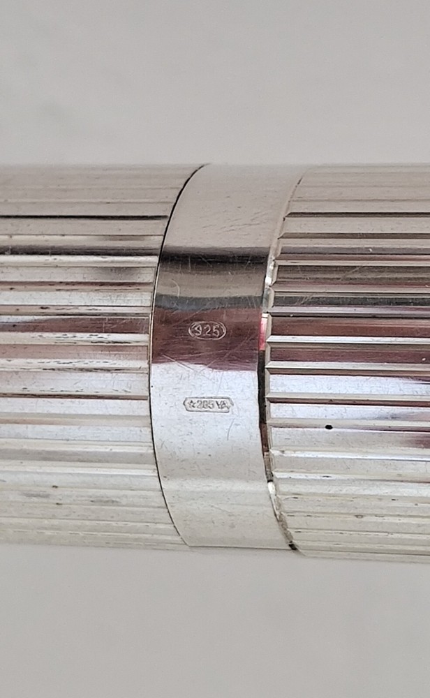 Perfume holder + makeup brush  