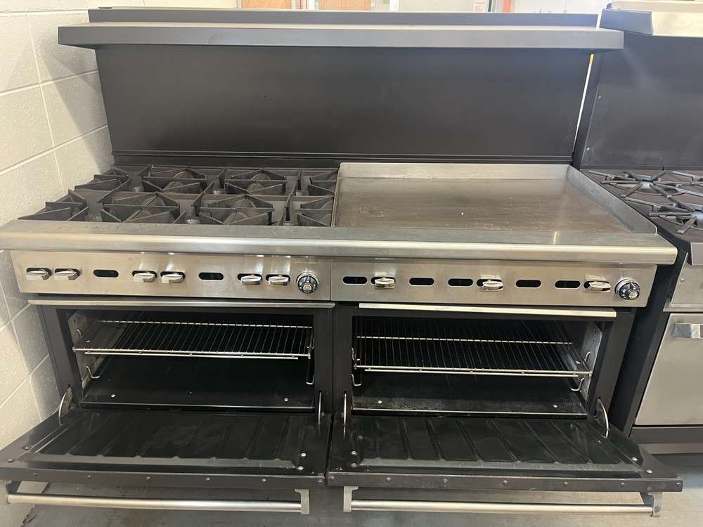 Wolf 6 burner and 33" Griddle with a double door oven