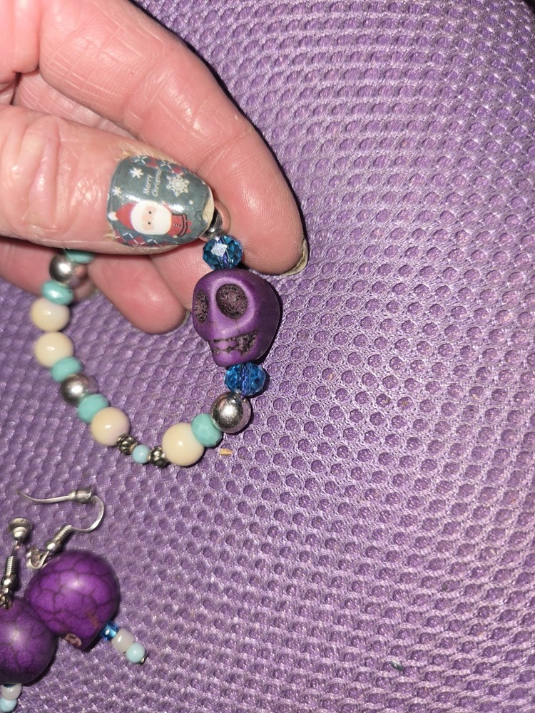 Skull Ear Ring & Bracket Set With Multiple Extra Multi Color Bracelts Set