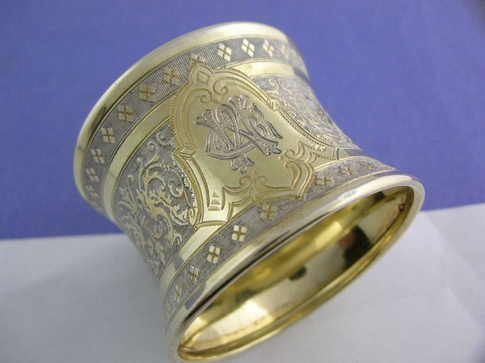 Decorative 800 Silver Napkin Ring w/ gold gilt finish & scroll patterns