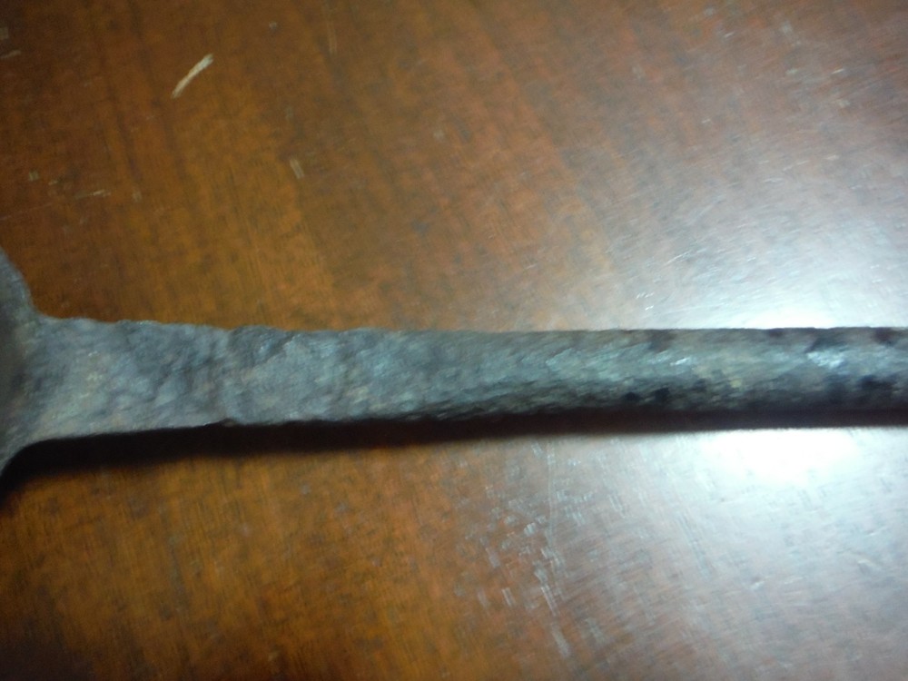 vintage huge metal spoon