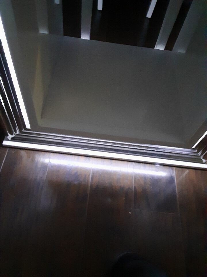 Marble Dining Table with 6 Gray Chairs and Beautiful Buffer with LED lights.