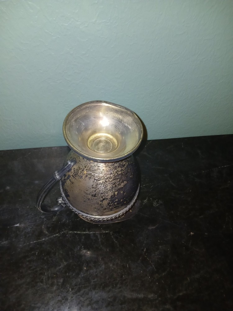 Victorian Silverplate Pitcher with Ornate Handle and Decorative Band