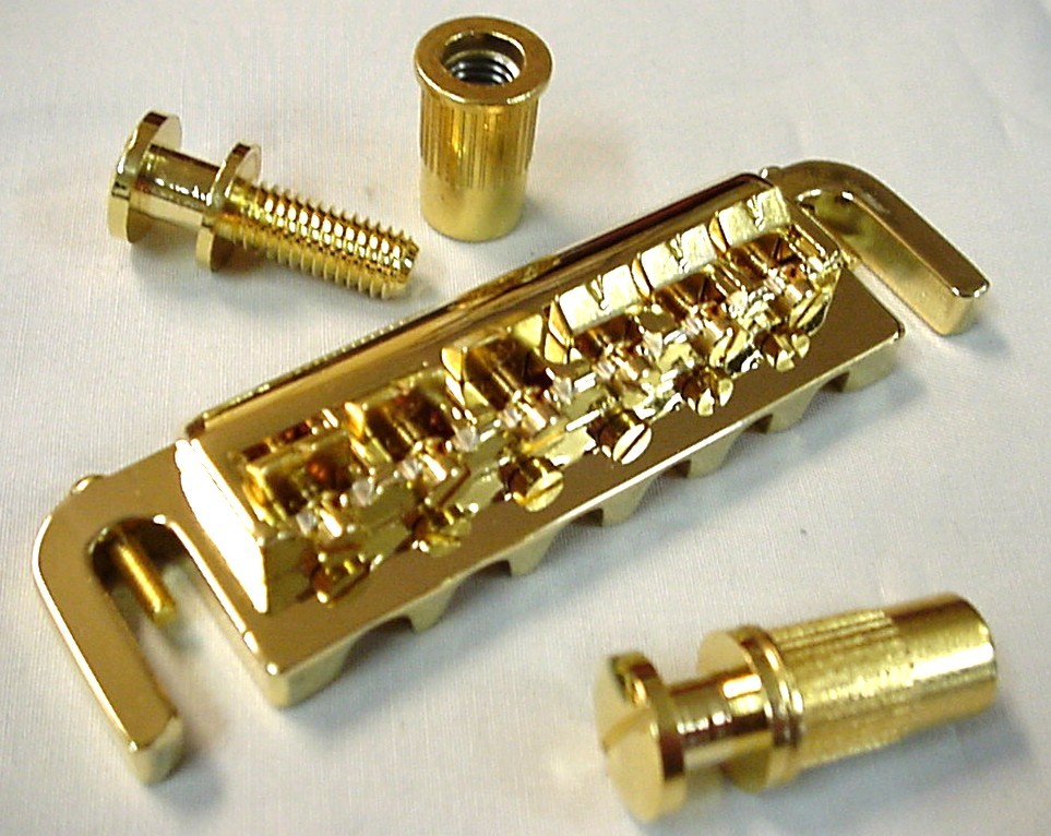 AMERICAN DESIGN ELECTRIC GUITAR BRIDGE GOLD