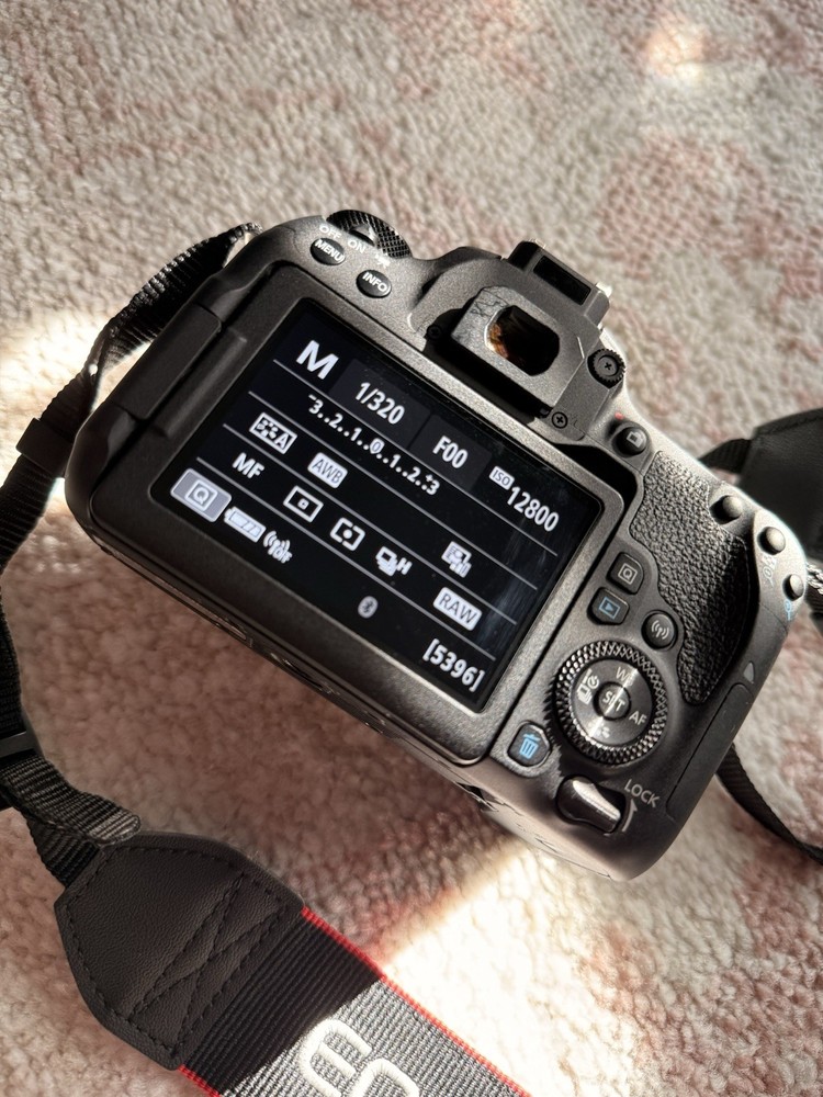 Canon EOS 77D Camera Accessory Bundle with EFS 18-55mm Lens, Strap, Charger