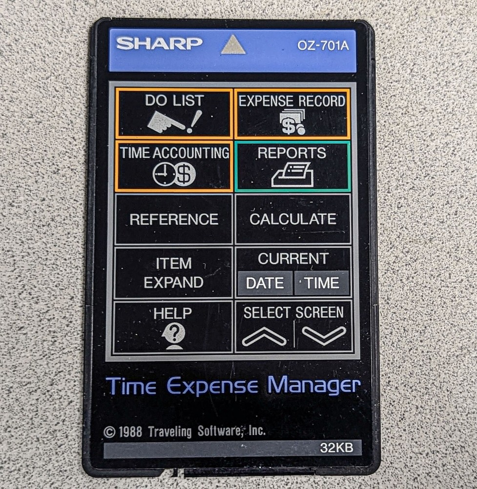 Sharp Wizard OZ-7000 Electronic Organizer with Time & Expense Manager Card