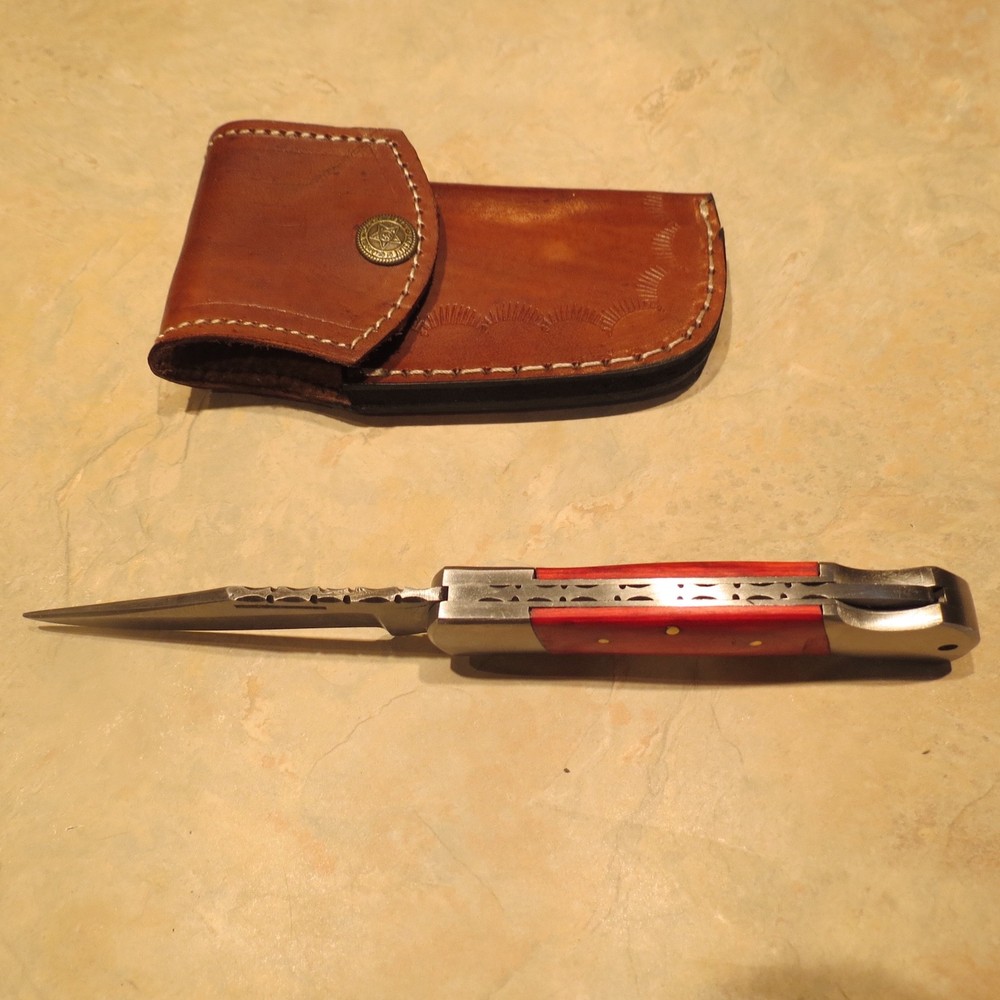 Damascus folding blade knife red laminate handle & leather sheath hand made