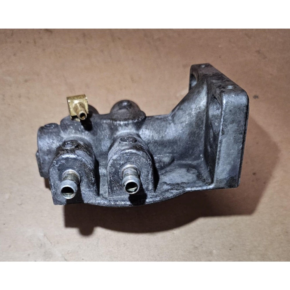 Fuel filter base, 2x 5/16" hose barbs, SAME SIDE (321)