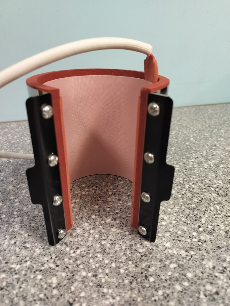 Mug heating element Attached For A Mug Heat Press Machine.