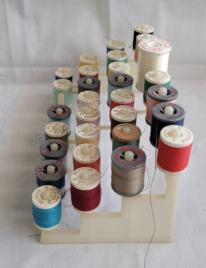 White Plastic Collectible Sewing Spools and Thread Rack Holder