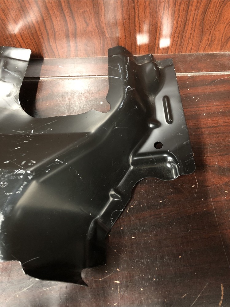 New Old Stock Unbranded Back Panel Bracket Part #68244050AA.