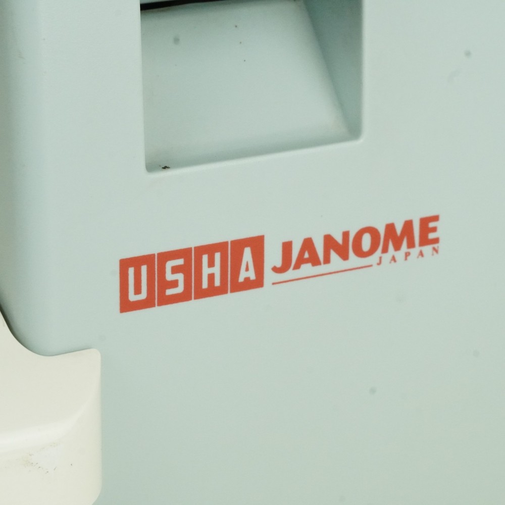 Usha Janome Automatic Stitch Magic Sewing Machine with 57 Stitch Function w/Case