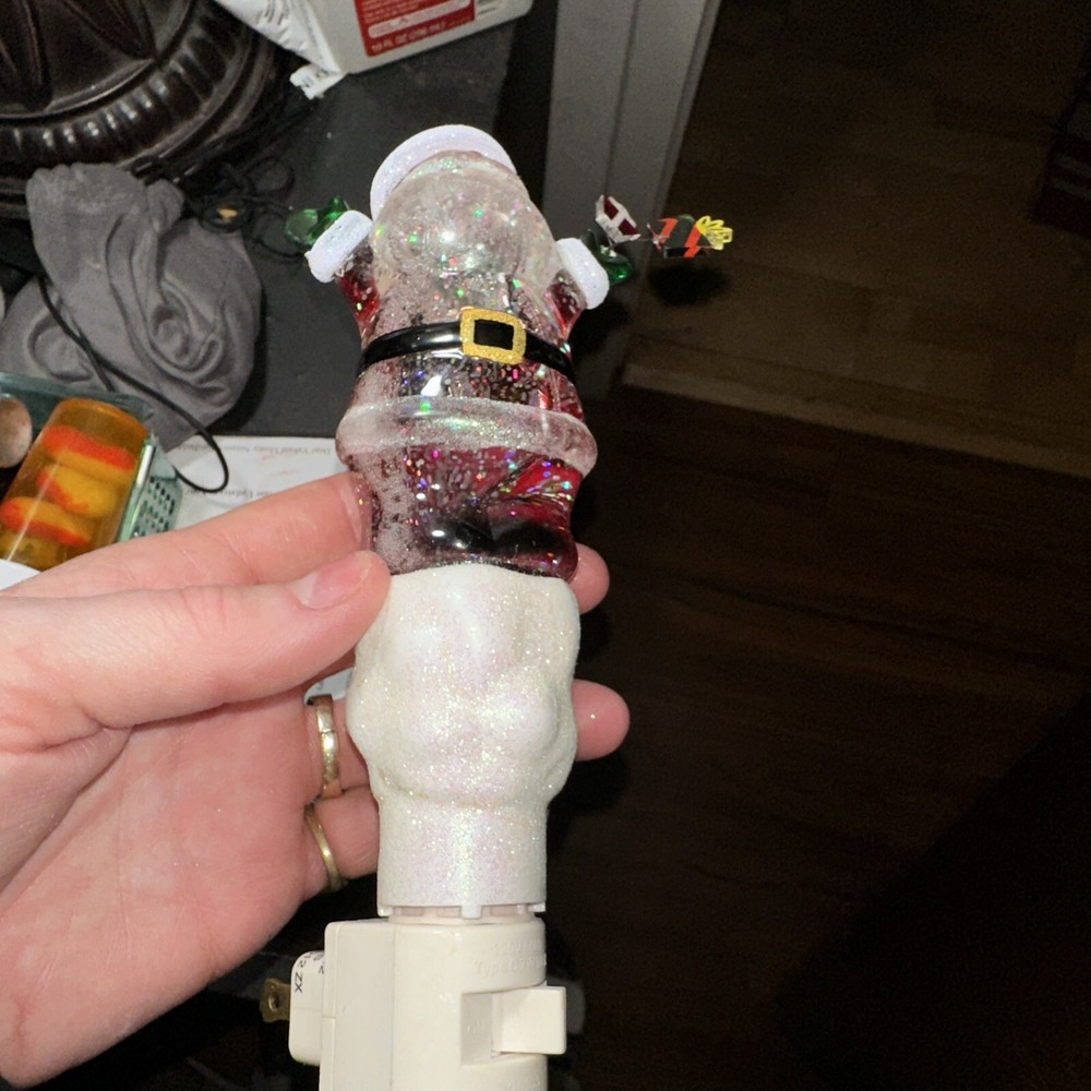 Santa night light with Jingles over his head