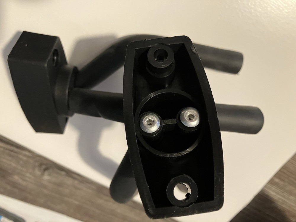 Three guitar wall hangers plus guitar hook