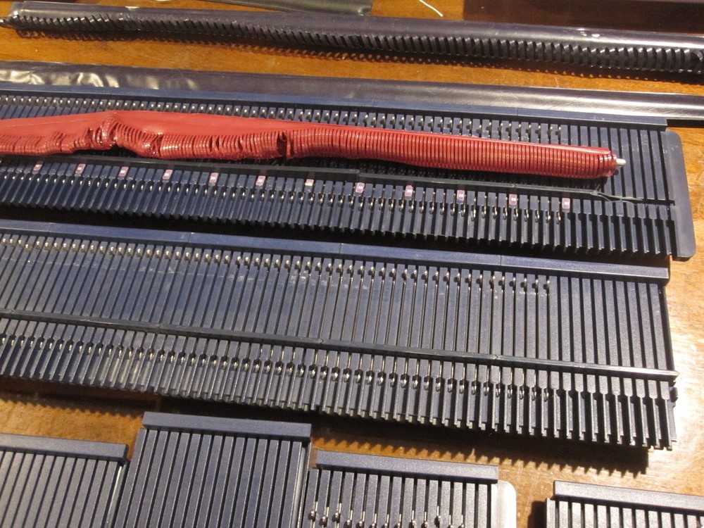 Bond Knitting Machine Two Beds Plus Extensions, Cast on Combs, some Accessories.