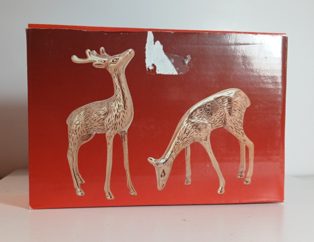 2 Solid Brass Deer. Distributed by Montgomery Ward.