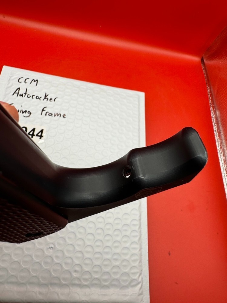 CCM Autococker Swing Frame Black