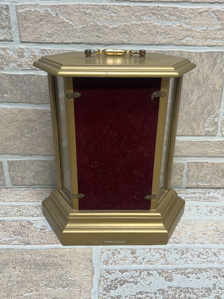 Quartz Clock Rotating Pendulum