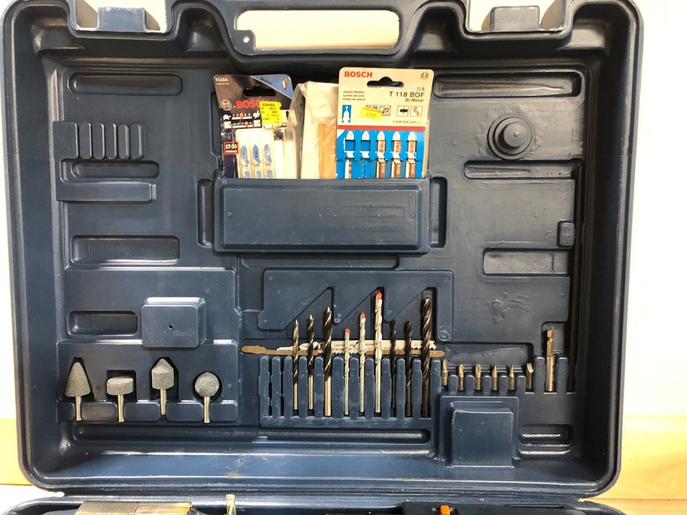 Bosch PSB 800-4 power tool kit with assorted accessories in hard case