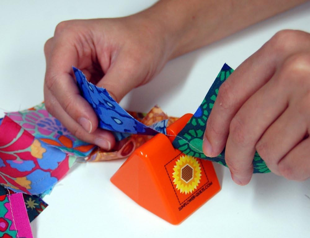 The Original Thread Cutter by (Orange)