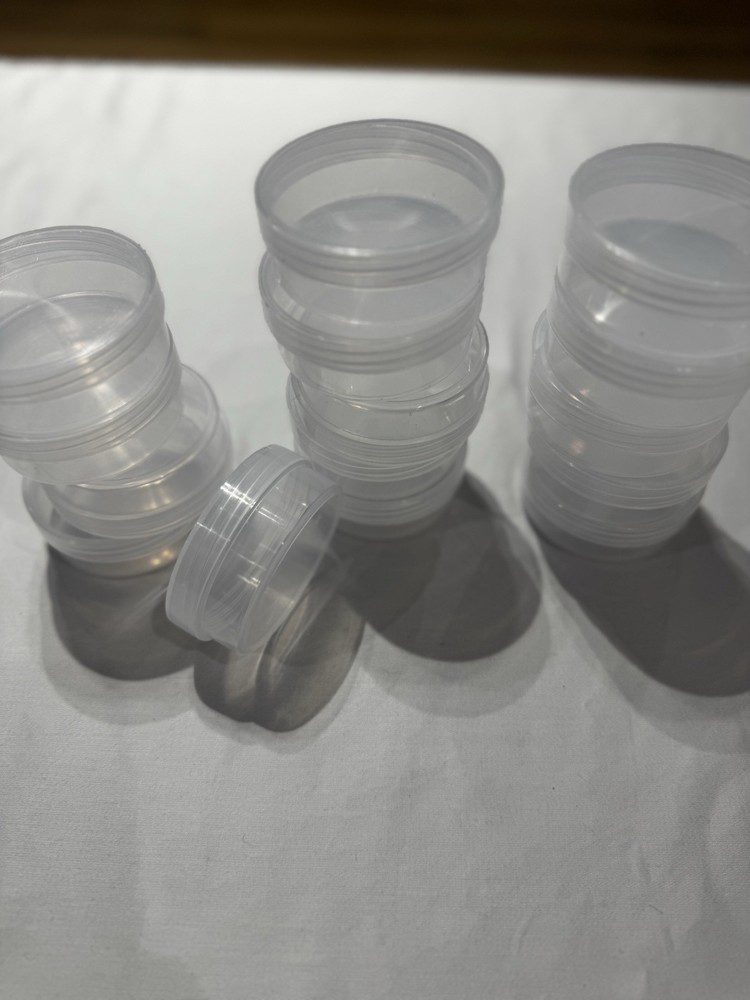 14 Small Twist Top Containers. (2in Long & 1/2 In Deep)