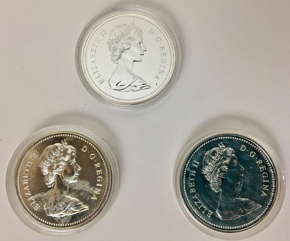 (3 lot) *WORLD COINS* uncirculated 1976 dollars "CANADA SILVER SET"
