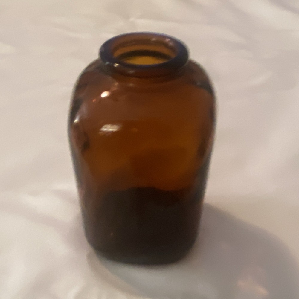 Vintage amber snuff bottle four dots on the bottom