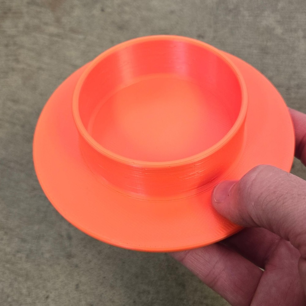 Anti-tip base for torch bottle