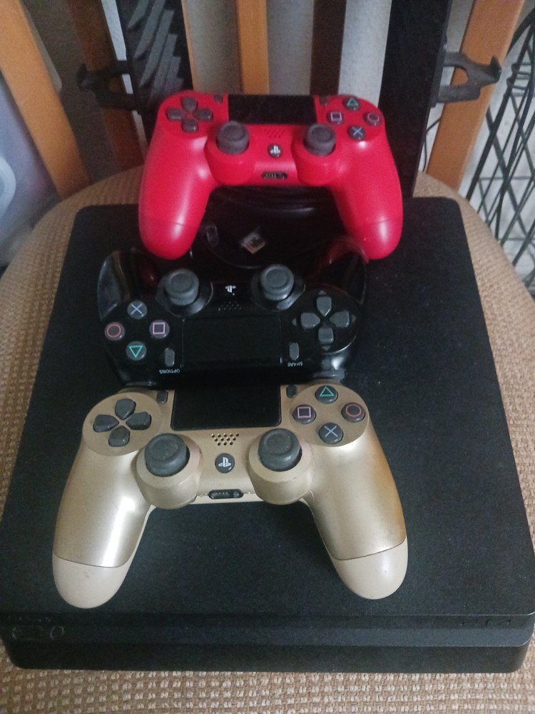 Ps4 Bundle Console With 3 Controllers, 8 Games, And a Game Storage Tower.