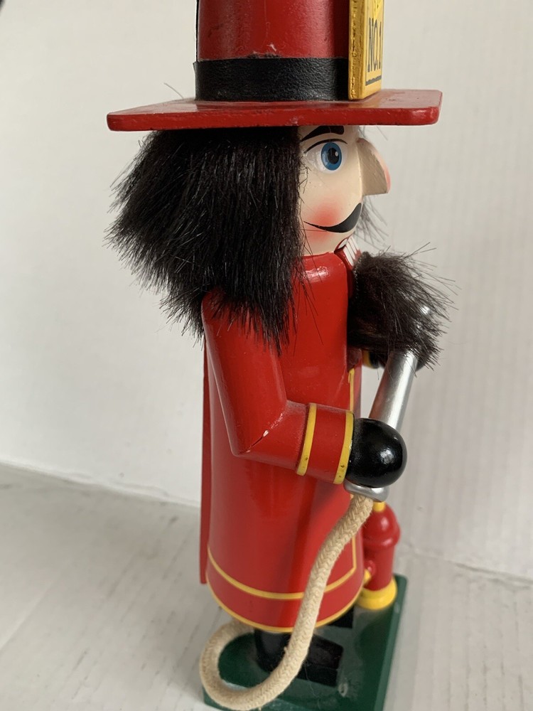 Wooden Fireman with Firehose & Fire Hydrant Nutcracker 10 In Tall
