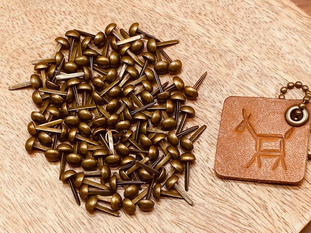 Bronze mushroom brads (50 count)