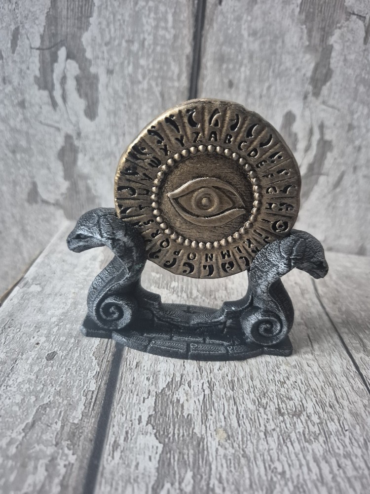 Indiana Jones Maraglyph Decoder Coin and stand