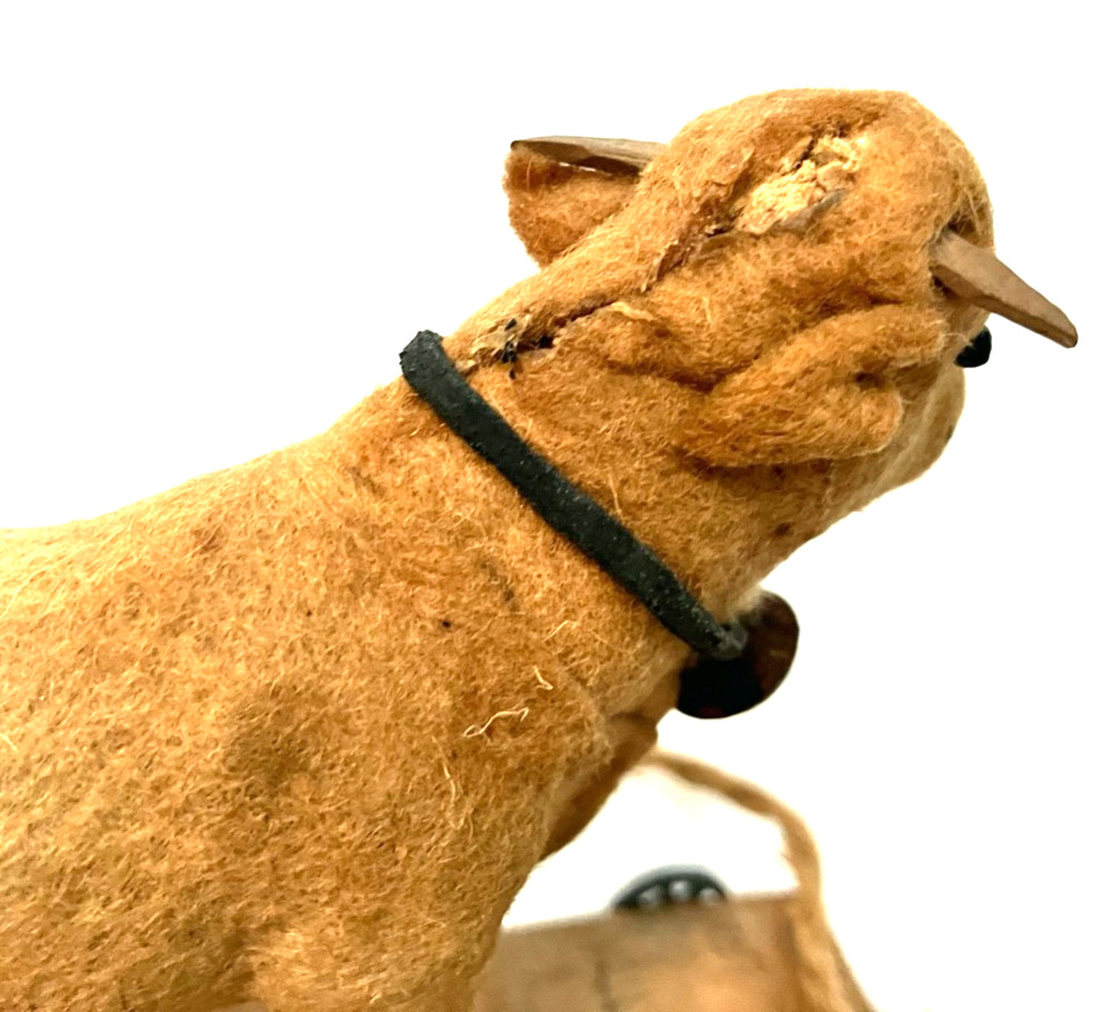 Antique childs felt covered pull toy