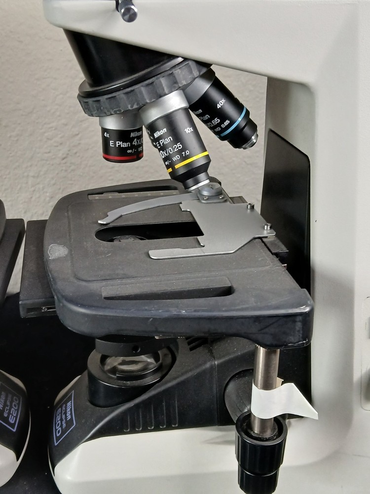 (2) Nikon Eclipse E200 Microscopes & E Plan 4 10 40 100X Oil Sets (No Heads)