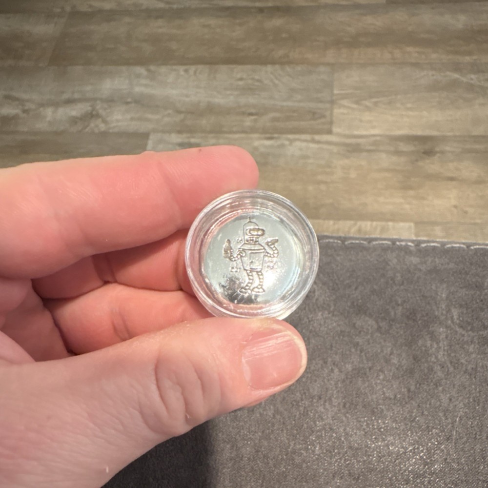 Bender 1 oz .999 silver hand pour