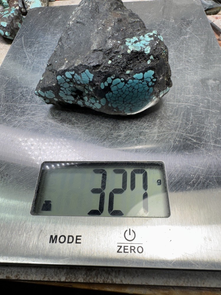 Hubei turquoise rough , solid spiderwebs nuggets in blue color tight pattern