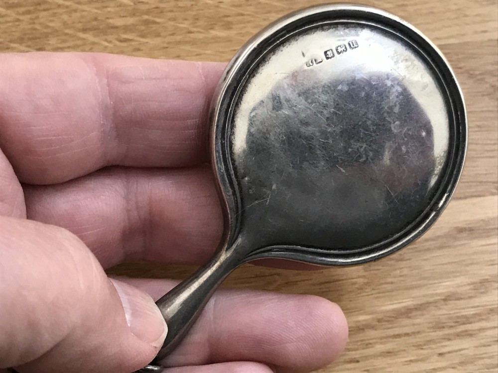 nice looking small size solid silver vanity mirror