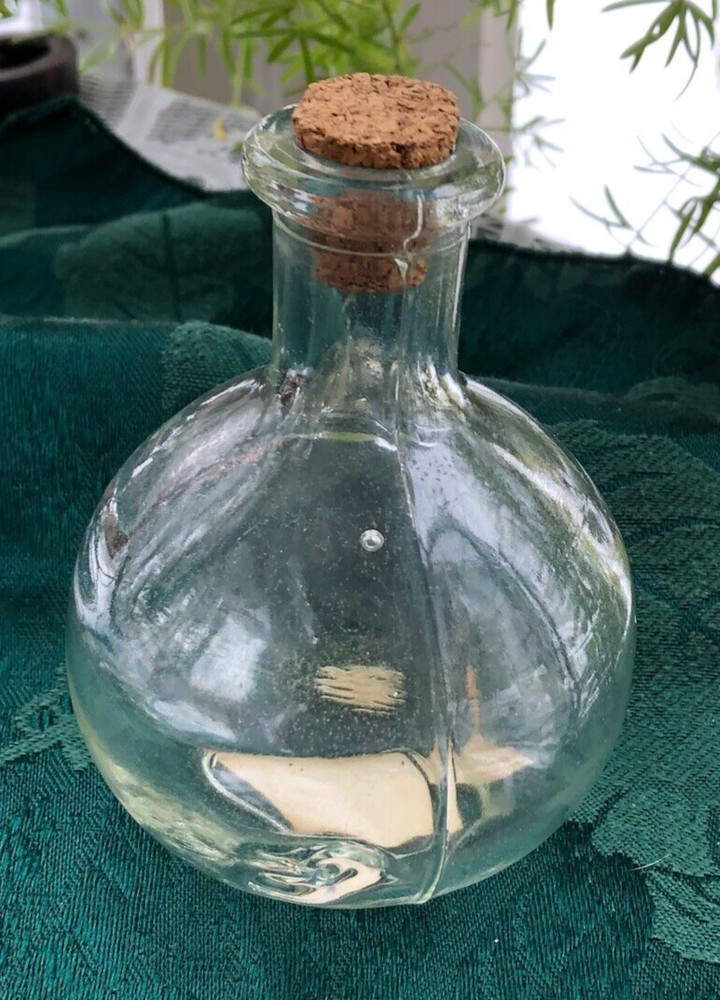 SMALL GLASS BOTTLE