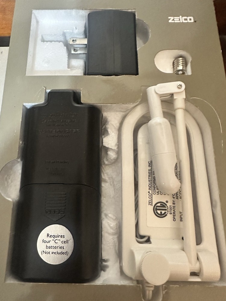1980’s Original, The "itty bitty book light". Before LED lights