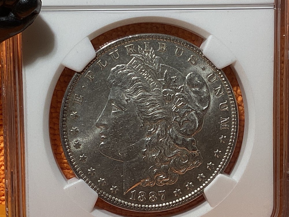 1887 MORGAN SILVER 💰 NGC MS61