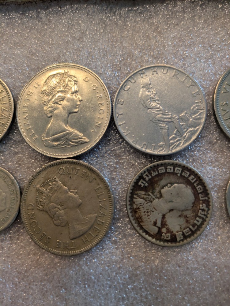 10 misc vintage foreign coins