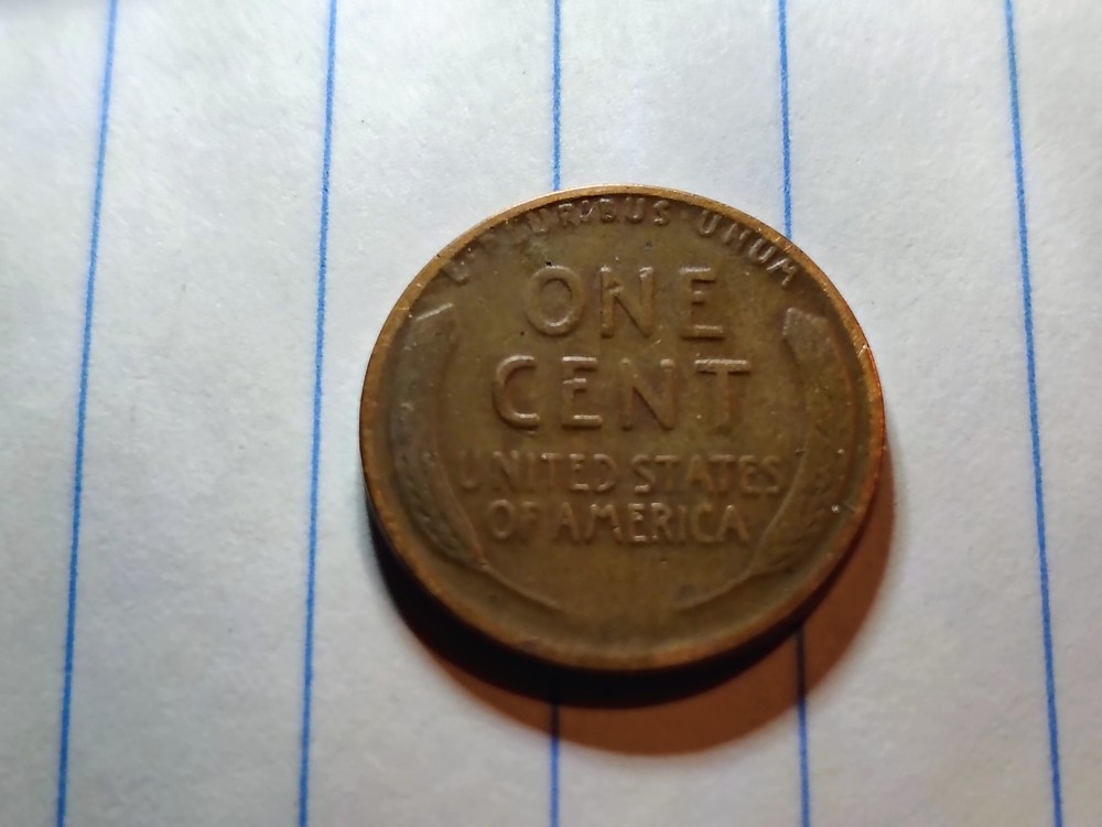 1928 D Wheat Cent With A Rim Cut On The Obverse Error