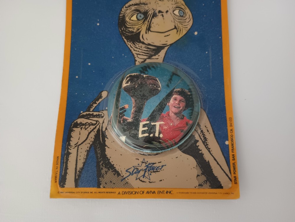1982 E. T. Photo Button New in Package & Mechanical E.T. Plastic Figure