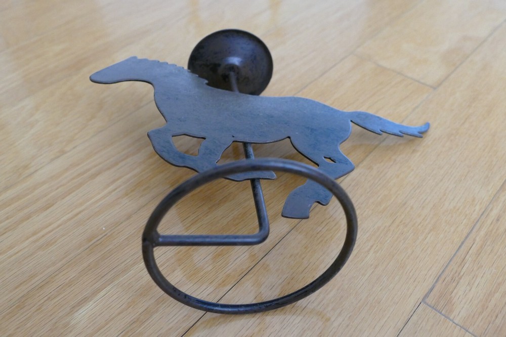 Western-style horse candle holder