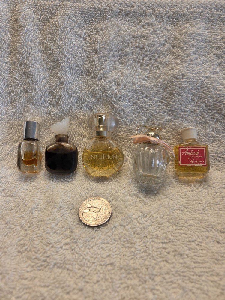 Five Miniature Perfume Bottles with Stoppers