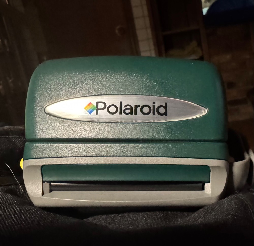 Polaroid One Step Express Camera with case and film