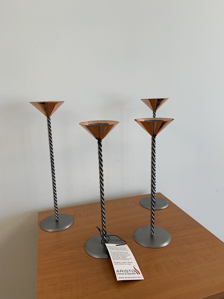 Four Copper Tea candle holders with twisted stem